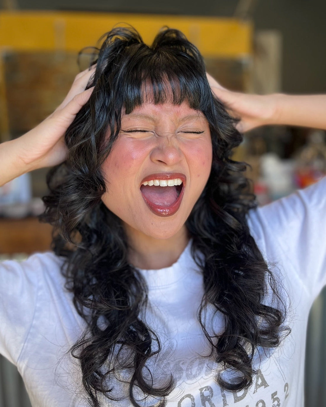 20 Layered Curly Hairstyles That Elongate and Lift