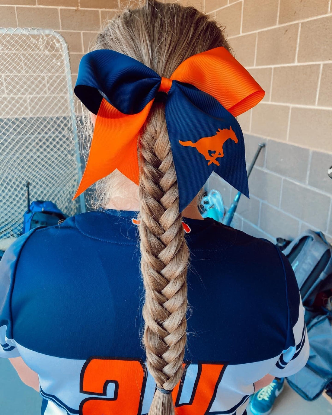 18 Game-Ready Softball Hairstyles for Athletes